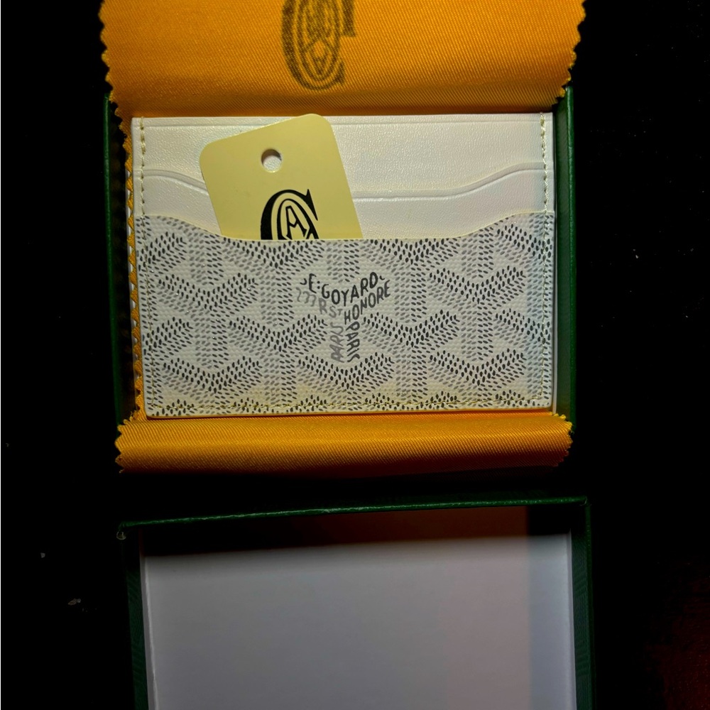Go yard card holder slim and holds cash as well very good for every day use